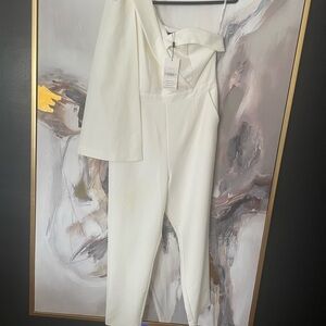 Lavish Alice Off-Shoulder Cape Style Jumpsuit
